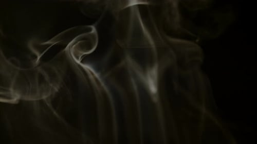Abstract Slow Motion Smoke on a Black Background