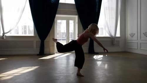 Blonde Dancing Woman is Performing Modern Dance in Hall Rehearsing Contemporary Choreography