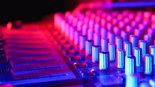 Working on Sound Mixing Console at the Dj Party in Night Club