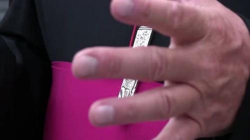 Clergy Member with Ring and Cross Close Up