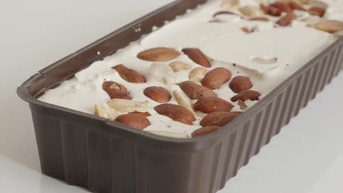Package of halva with pistachio and peanuts 4K video