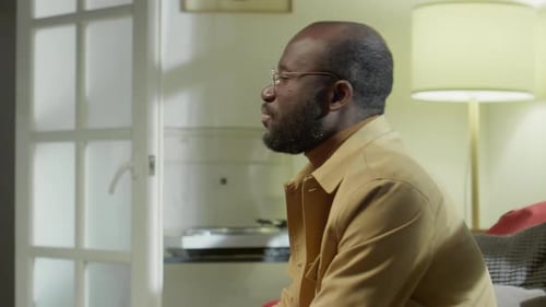 Man and Woman Having a Conversation at Home