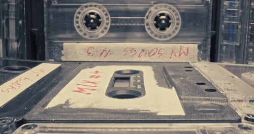 Vintage cassette and player. Player with spinning audio cassette.