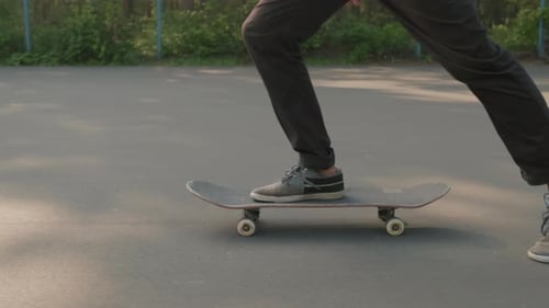 Unrecognizable Man Riding Skateboard
