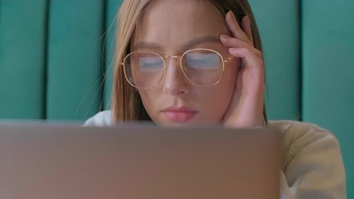 Closeup Portrait of Businesswoman Working at Modern Office and Using Computer Touchscreen, Looking