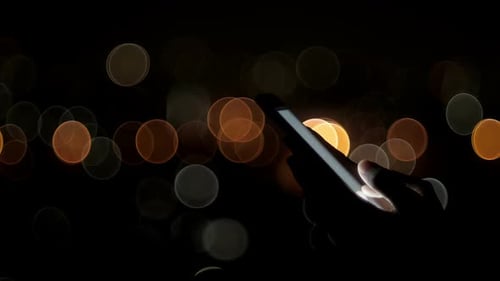 Use Smartphone With City Bokeh Lights