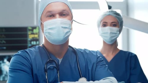 Professional medical doctors working in emergency medicine. Portrait of surgeon and the nurse.