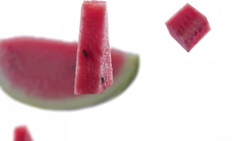 Slow Motion Falling Watermelon Slices and Whole Fruit