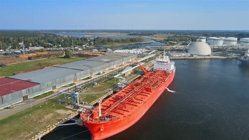 Oil tanker in port terminal in industrial zone