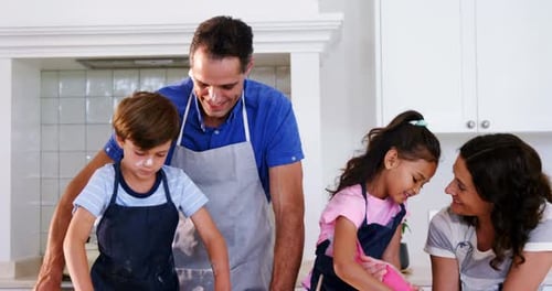 Family Bakes Together in Bright Kitchen