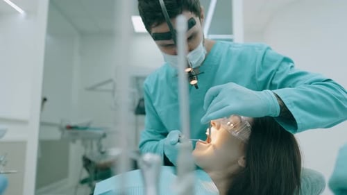 Dentist Working on Patient in Modern Clinic