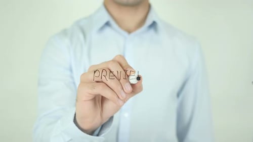 Man Writing Preview on Clear Screen