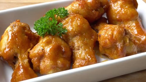 Close Up of Shiny Fried Chicken Wings
