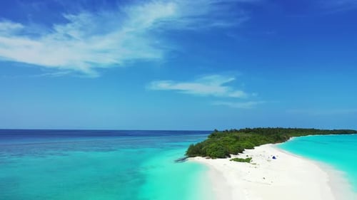 Aerial view seascape of perfect tourist beach vacation by clear lagoon and white sand background of