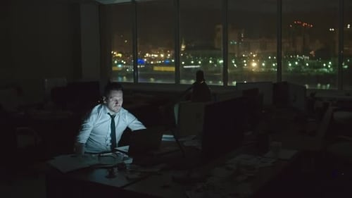 Businessman Working at Night Office