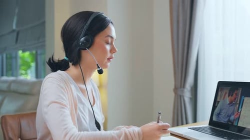 Young Woman Studying Online Video Call From Home