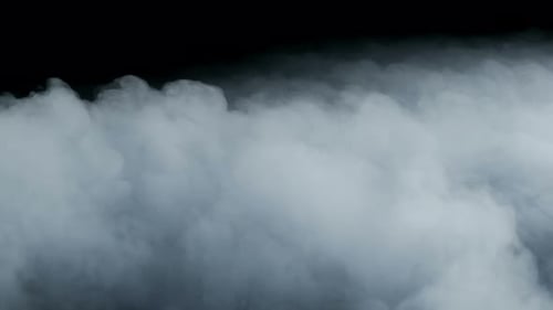 Billowing White Smoke Against a Black Background
