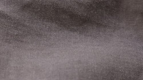 Flax plant linen fabric for clothes close-up details 4K 2160p 30fps UltraHD tilting footage - High q