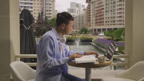Male student in cafe.