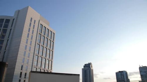 Young Adult Skateboarding in the City