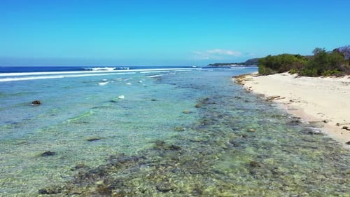 Aerial view landscape of idyllic island beach lifestyle by turquoise ocean and white sand background