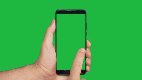 Hand Holds Smartphone with Green Screen Display