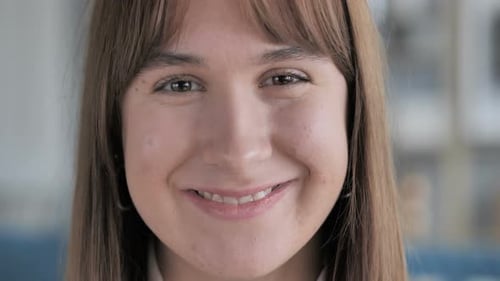 Close Up of Smiling Casual Young Girl Face