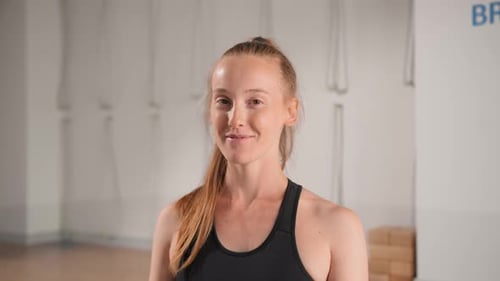 Close-up: girl doing yoga pilates stretching and looking for relaxation in meditating
