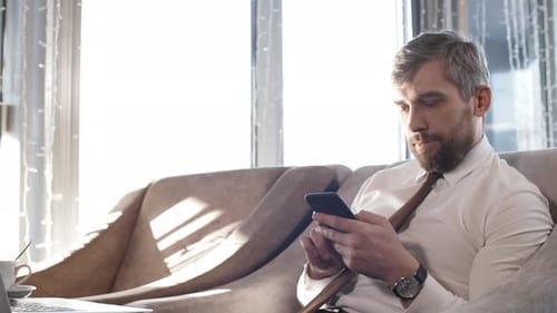 Businessman Using Smartphone