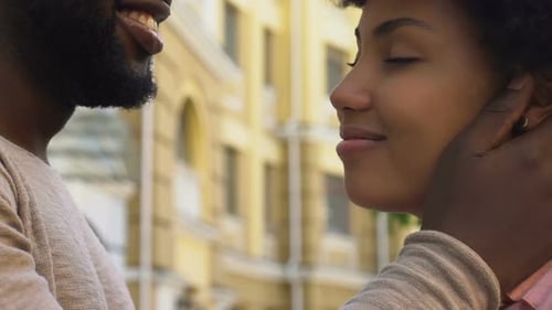 Affectionate Couple Embracing Tenderly in an Urban Setting