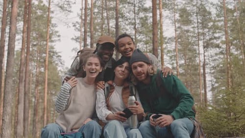 Portrait of Cheerful Friends in Forest