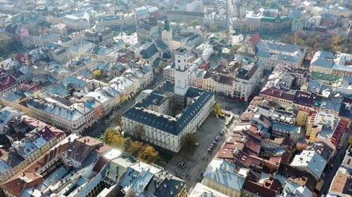 Aerial Drone Video of Lviv Old City Center - Roofs and Streets, City Hall Ratusha