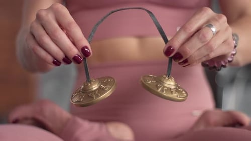 Young Woman Makes Yoga in Her Home Studio