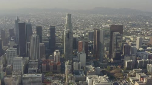 AERIAL: Breathtaking Wide Shot of Downtown Los Angeles, California Skyline in Beautiful Sunlight