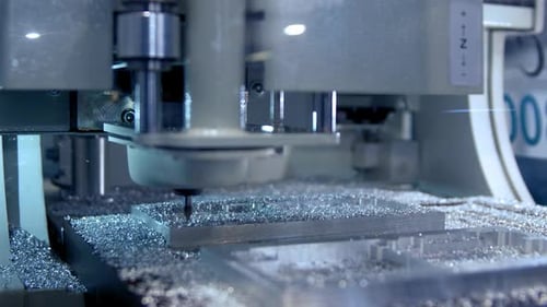 CNC Machine Precisely Cutting Metal Block