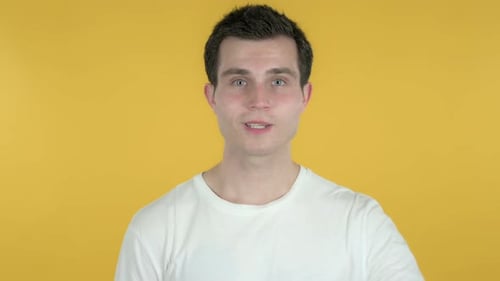 Okay Sign By Man, Yellow Background