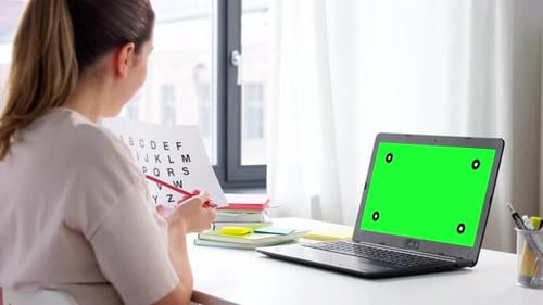 Young Adult Learning the Alphabet at Home