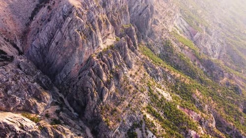 Aerial Drone Flight Over Incredible Mountain Landscape in Golden Hours at Dawn Valley with Forest