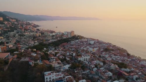 Coastal Cityscape at Sunrise Aerial View