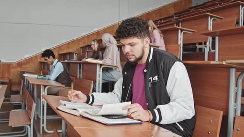 Male Student Trying to Cheat during Exam