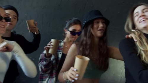 Friends Dancing and Laughing Together