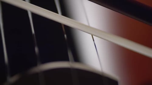 Cello Strings and Bow Close Up Shot