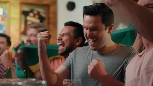 Stressed football fans supporting their team