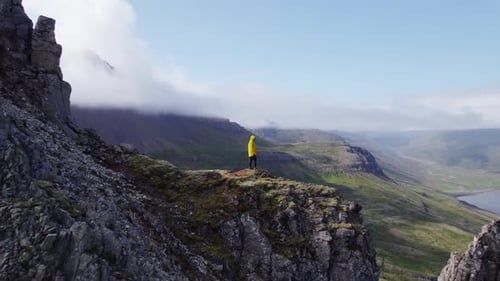Drone Flight Of Man Standing On Mountain Peak