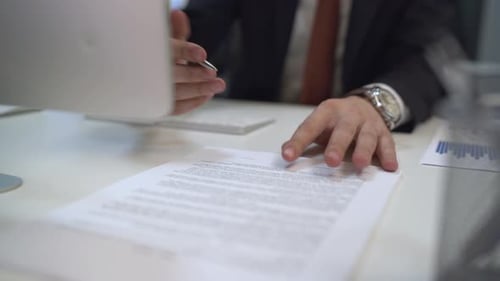 Signing a paper and typing