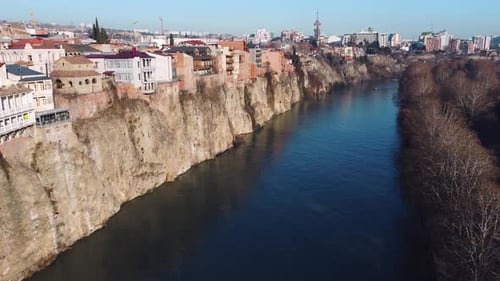 Cityscape Aerial View of River and Cliffside