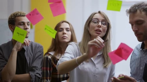 Diverse Group of Finance Office Worker Having Corporate Training and Using Glass Wall