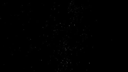 Abstract Particle Grain Animation on Black Background