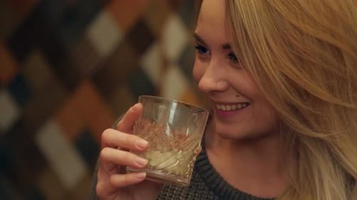 Woman Drinking Beverage in Close Up Shot