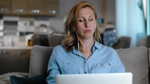 Woman On Laptop In Home Office